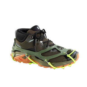 Snowline traction spikes attached to a Salomon hiking boot