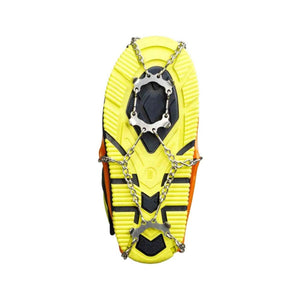 Yellow and black boot sole with metal ice traction cleats attached