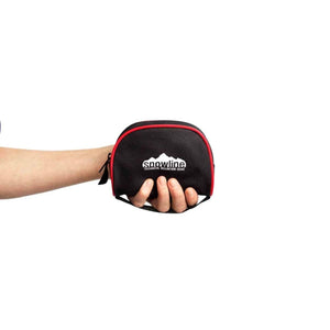 Hand holding a small black Snowline technical mountain gear storage pouch