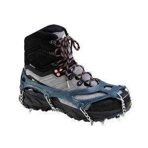 Snowline Chainsen Walk traction spikes attached to a grey and black hiking boot