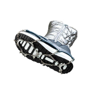 Snowline traction spikes attached to a silver winter boot