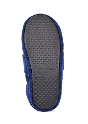 Bottom view of a navy blue slipper with a textured rubber grip sole