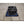 Mattress Cooler unit with black fan housing and control dial on a blue cooling pad