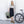 Woman standing next to a bicycle holding an olive green Thule backpack