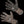 Stormr camouflage gloves with black hexagonal grip pattern on palms