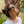 Person wearing black Suncloud sunglasses in profile view