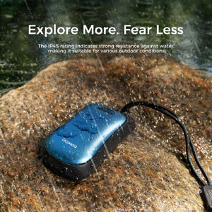 Ocoopa hand warmer on a wet rock during rain