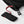 Hestra black glove cuff with red pull tab and adjustable toggle