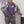 Person wearing a TechKewl cooling vest under a hazardous materials suit