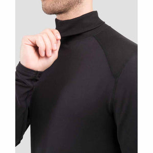 Man wearing a black long sleeve mock neck shirt with ribbed shoulder panels