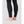 Back view of black leggings with Ten Thousand logo on the lower leg