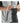 Person inserting a Therm-ic heat pack into a black winter glove