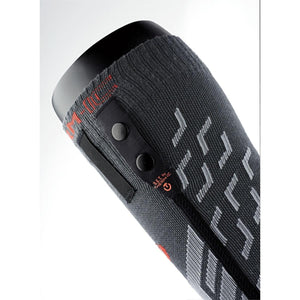 Therm-ic heated sock cuff with two black snap buttons and power icon