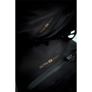 Close up of black fabric featuring gold Ultra Warm branding and zipper pocket