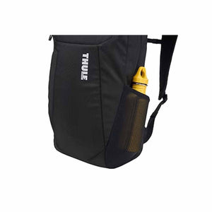 Thule black backpack with a yellow water bottle in the side mesh pocket