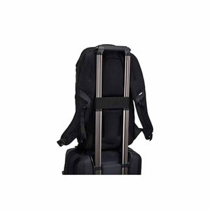 Thule black backpack attached to luggage handle
