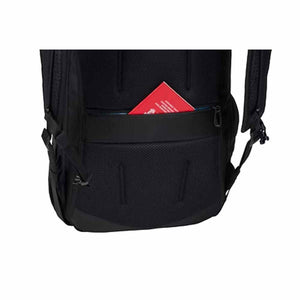 Thule backpack back panel with a passport in the hidden security pocket