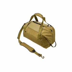 Tan Thule duffel bag with top handles and detachable shoulder strap