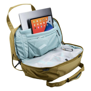 Open Thule backpack showing internal laptop and tablet sleeves with mesh organization pockets