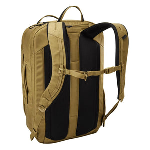 Back view of tan Thule backpack with black padded shoulder straps and sternum strap