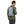 Man wearing a light blue Thule hydration backpack