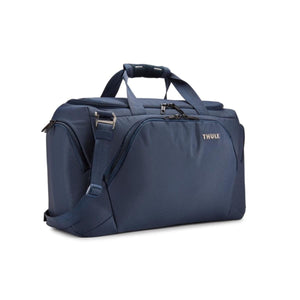 Thule navy blue duffel bag with top handles and shoulder strap