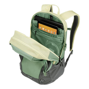 Open Thule backpack showing internal laptop and tablet compartments with mesh pockets