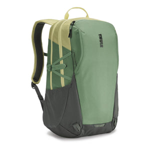 Thule green and yellow backpack with side mesh pockets and front compression straps