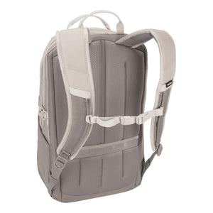 Back view of a light grey Thule backpack showing padded shoulder straps and mesh back panel