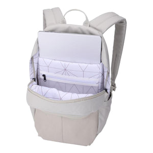 Open beige backpack with laptop sleeve and geometric patterned interior lining