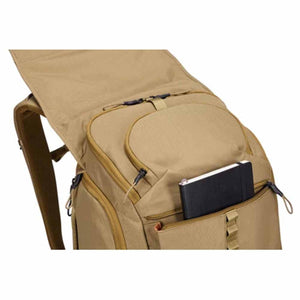 Thule tan backpack with open top flap and notebook in front pocket