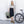 Woman standing next to a bicycle holding an olive green Thule backpack