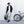 Person in cycling gear holding a green Thule backpack next to a bicycle