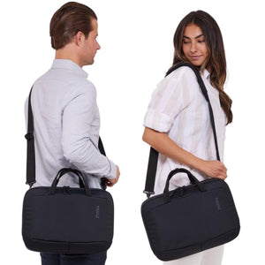 Man and woman wearing black Thule laptop bags over their shoulders