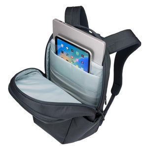 Thule backpack with open main compartment showing laptop and tablet sleeves