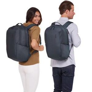 Man and woman wearing Thule backpacks