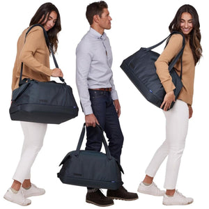 People carrying Thule duffel bags in various positions