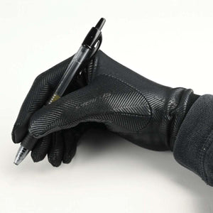 Hand wearing a black Seirus glove holding a black pen