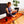 Woman sitting on a ToastiMat heated mat reading a book