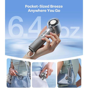 Torras handheld portable fan showing weight and compact size for storage in bags or pockets