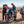 Two motorcyclists in Tourmaster gear refueling a motorcycle in the desert