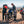 Two motorcyclists in Tourmaster gear refueling a motorcycle in the desert