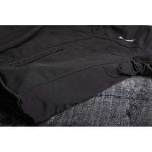 Close up of black Tourmaster motorcycle jacket side panel and zipper
