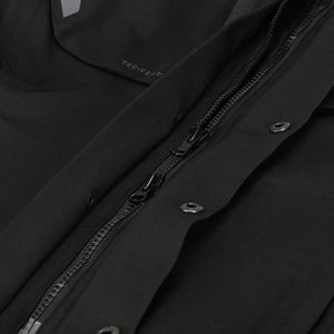 Close up of a black Tourmaster motorcycle jacket zipper and snap buttons