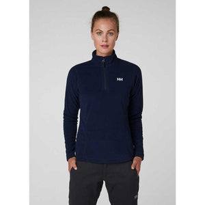 Woman wearing a navy Helly Hansen quarter zip fleece pullover