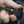 Trillium Worldwide power adapter with red indicator light plugged into a vehicle outlet