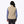 Back view of a woman wearing a beige Mobile Warming sherpa fleece vest over a blue long sleeve shirt
