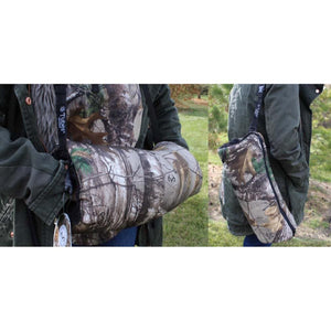 Person wearing a camouflage Tubes Sport hand warmer muff