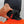 California Heat Spark battery pack attached to a black balaclava