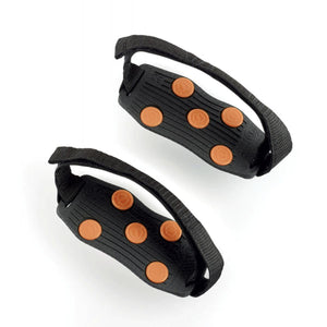 Sidas black rubber traction cleats with orange studs and adjustable straps